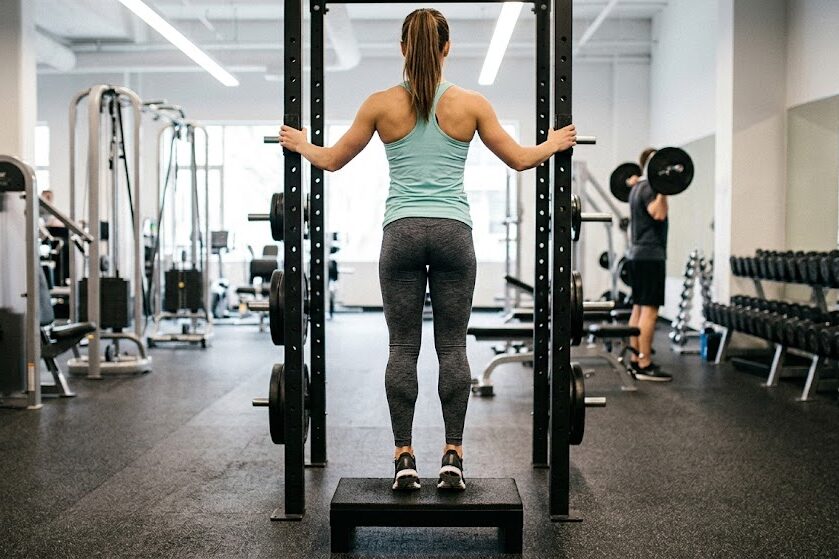 Perform standing calf raises with full range of motion