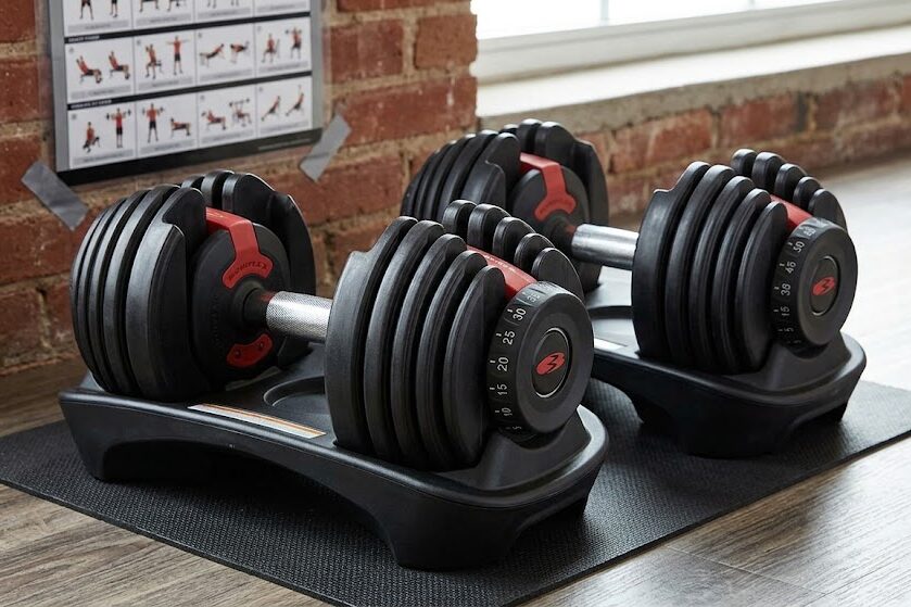 Use adjustable dumbbells for lower body strength workout